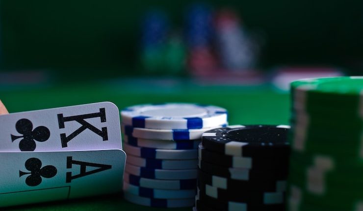 white and black dice on green table