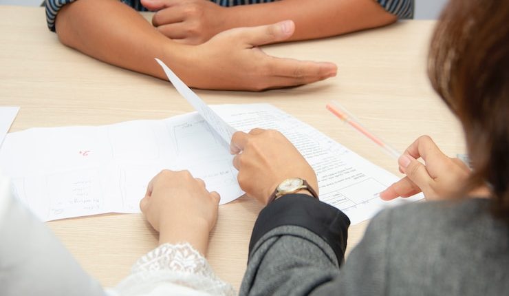 person wearing black coat close-up photography