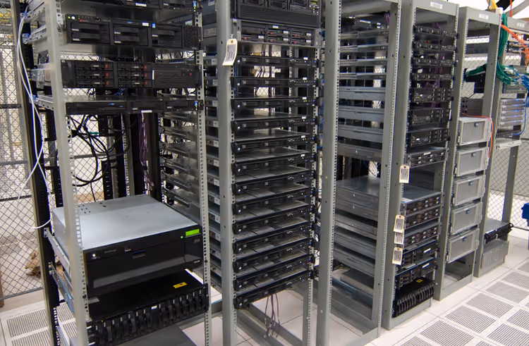 Physical server in a data center rack with LED indicators