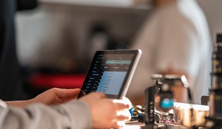 person holding black android smartphone