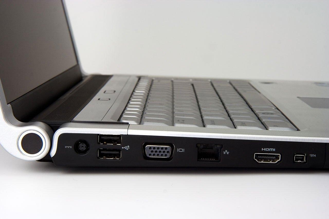 hdmi to vga adapter, black, accessories computer 📸📸 Realistic photo of small HDMI to vga active adapter lying on desk near a laptop, soft shadows 📸📸 Перехідник HDMI-VGA на робочому столі